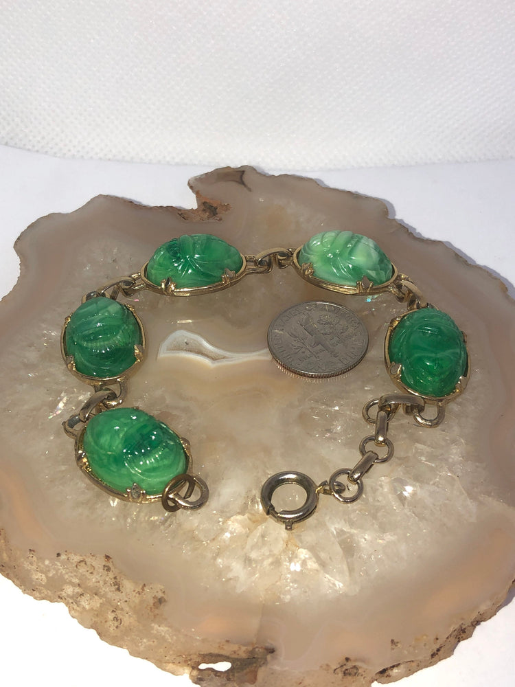 Vintage green And white swirl carved  Peking glass scarab bracelet link gold tone 7.5 Inches usable