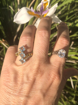 Beautiful blue topaz triple stone ring  sterling silver 925 gold tone too princess cut size 5.25