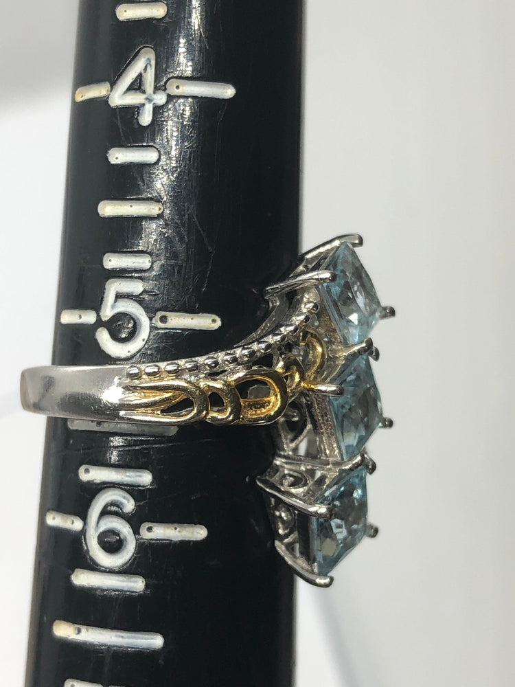 Beautiful blue topaz triple stone ring  sterling silver 925 gold tone too princess cut size 5.25