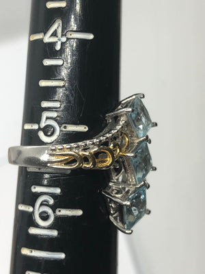 Beautiful blue topaz triple stone ring  sterling silver 925 gold tone too princess cut size 5.25
