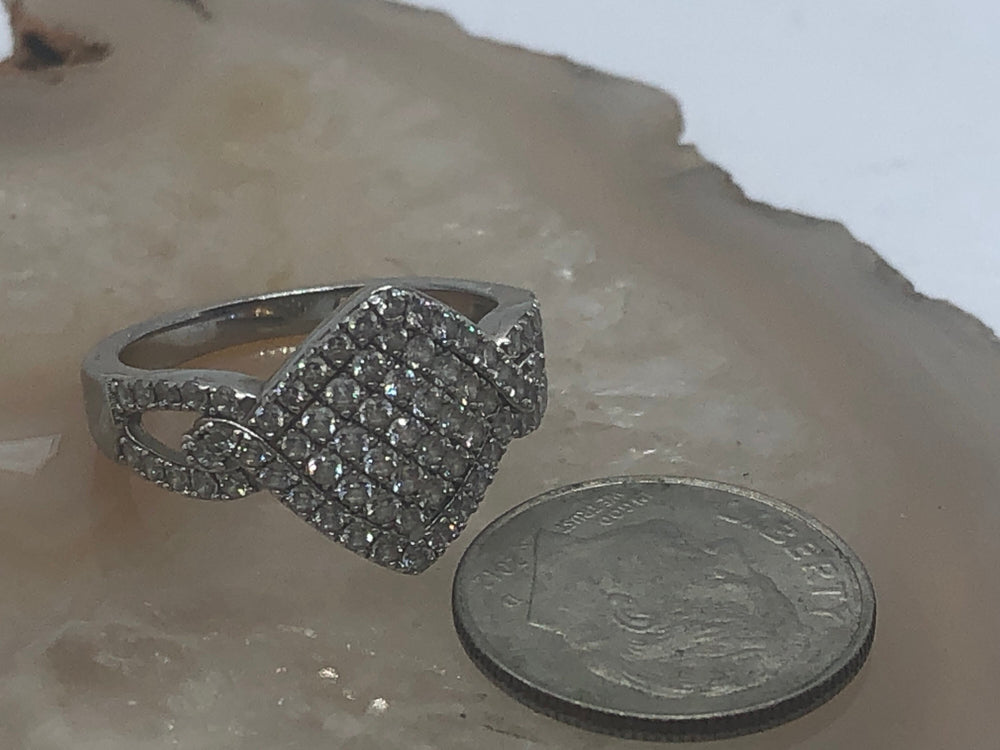 Beautiful CZ crystal ring fake pave set diamonds size 7 look real! Sterling silver 925