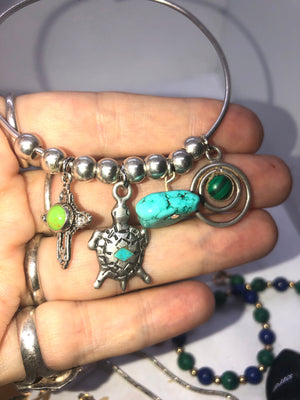 Vintage sterling silver bangle bracelet native American southwestern charms Navajo pearls Zuni turtle turquoise cross malachite