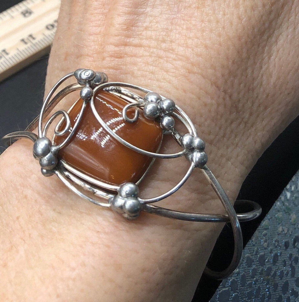 Beautiful handmade vintage sterling silver wire wrapped brick colored glass cuff bracelet