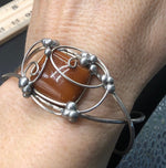 Beautiful handmade vintage sterling silver wire wrapped brick colored glass cuff bracelet