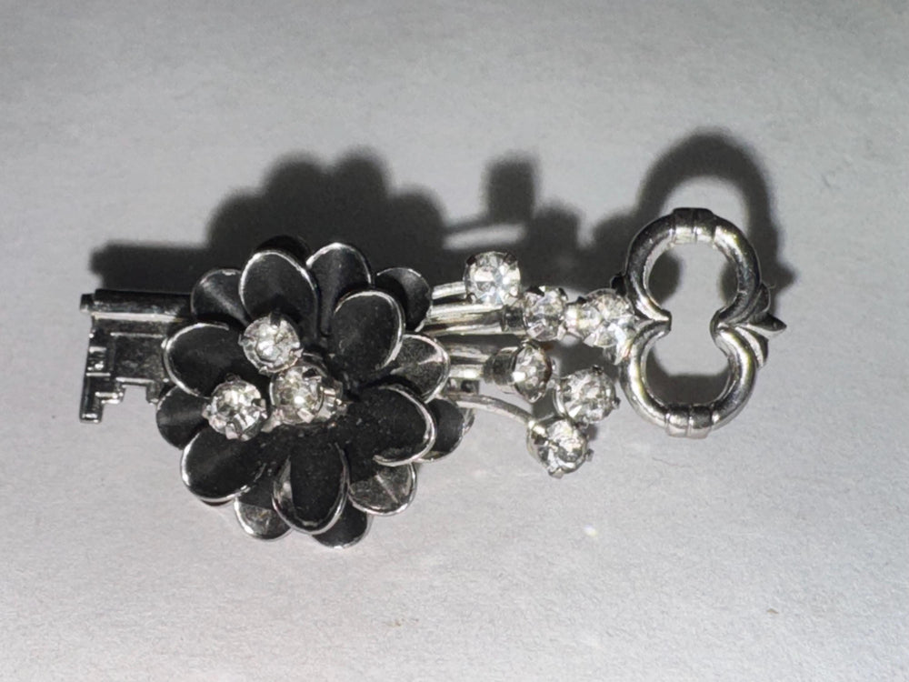 Vintage Skeleton Key Brooch with Black Enamel Flower and Rhinestones – Mid-Century Costume Jewelry
